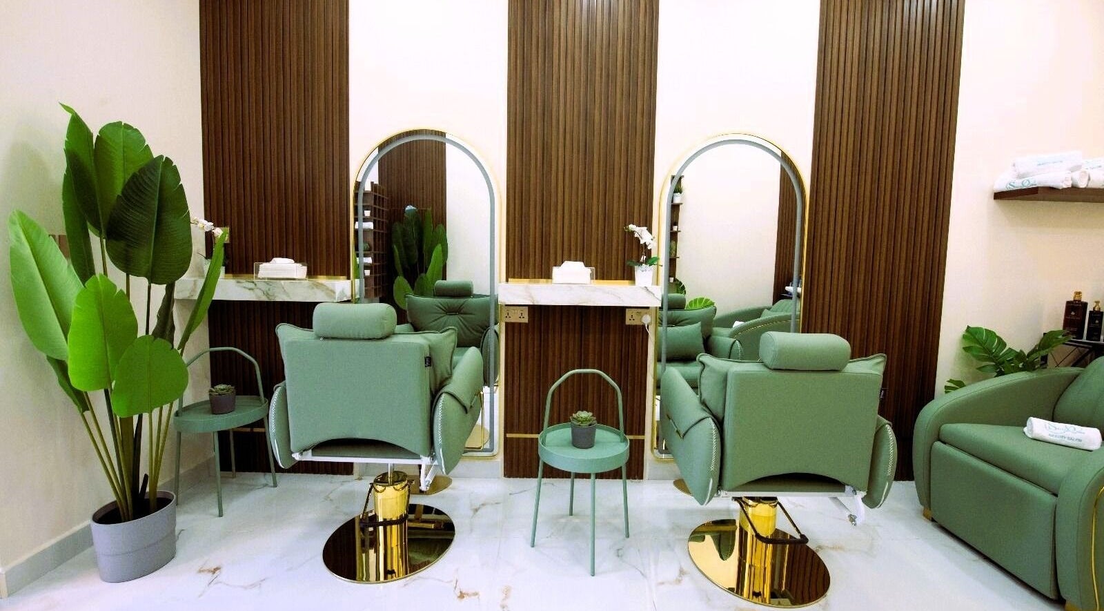 Elegant salon interior at Sally Queen Salon, Dubai, Dubai, AE, featuring modern chairs and stylish decor.