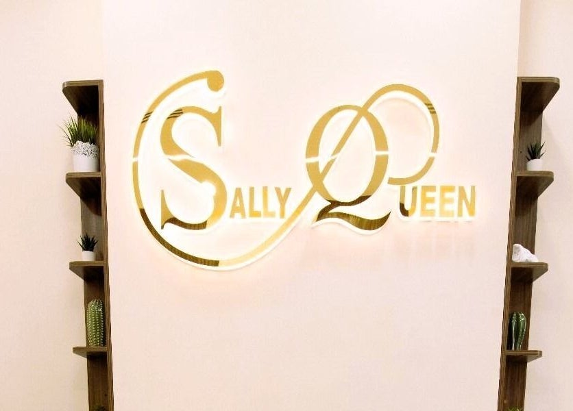 Elegant decor and logo at Sally Queen Salon, Dubai, Dubai, AE showcasing luxury and style.