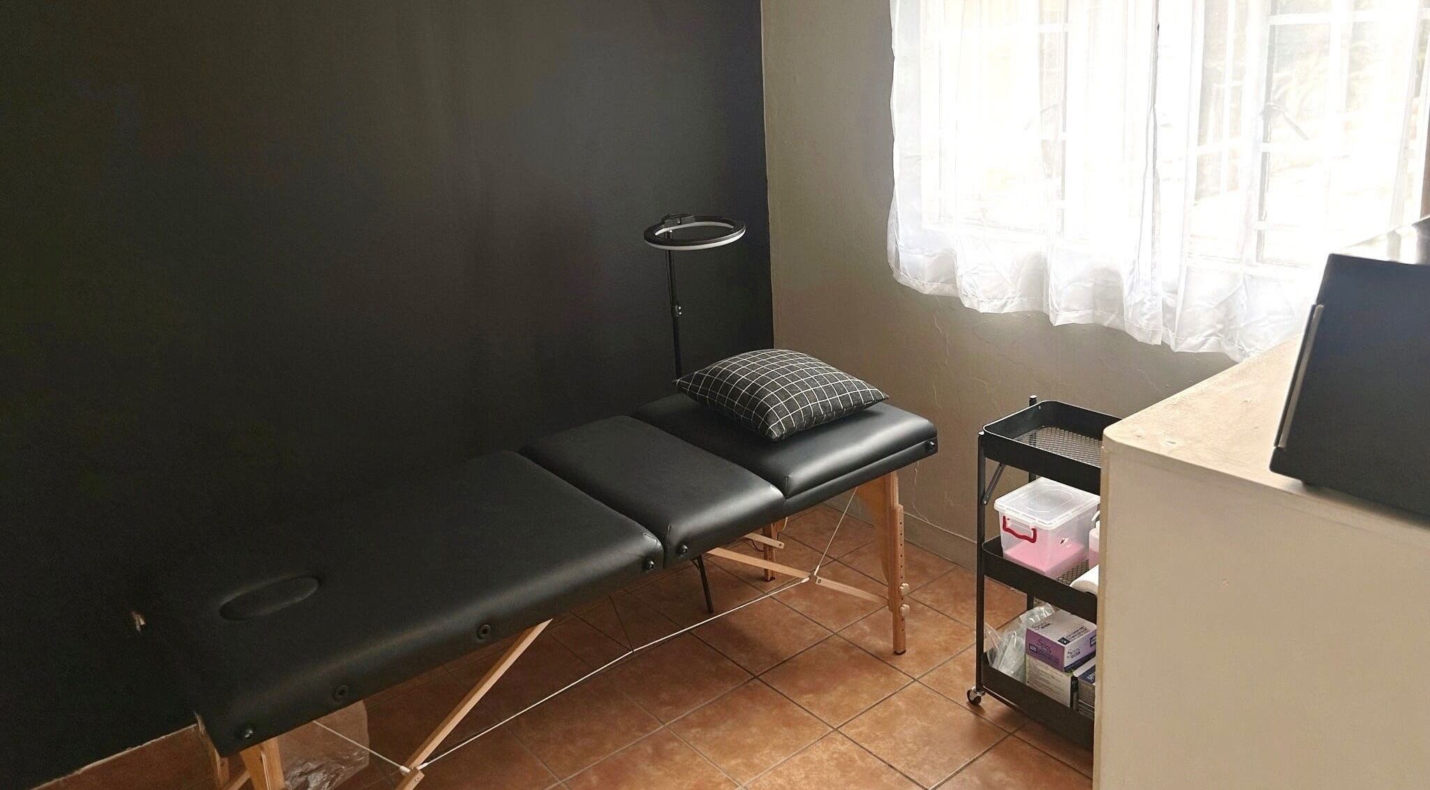 Serene treatment room at Altered Studio, Edenvale, Gauteng, ZA with massage table and natural light.