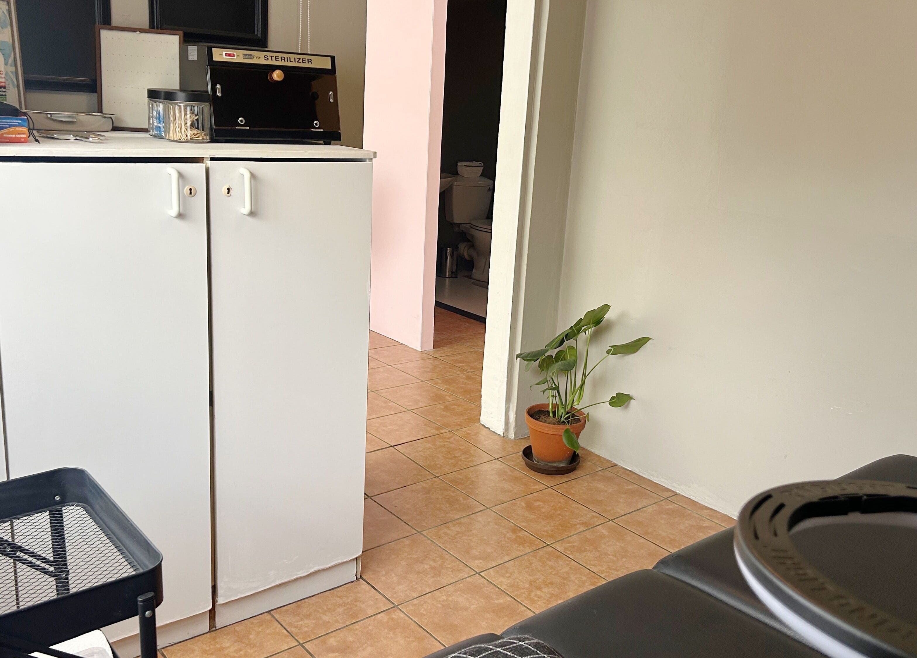 Relaxing corner at Altered Studio, Edenvale, Gauteng, ZA. Features a plant and inviting ambiance.