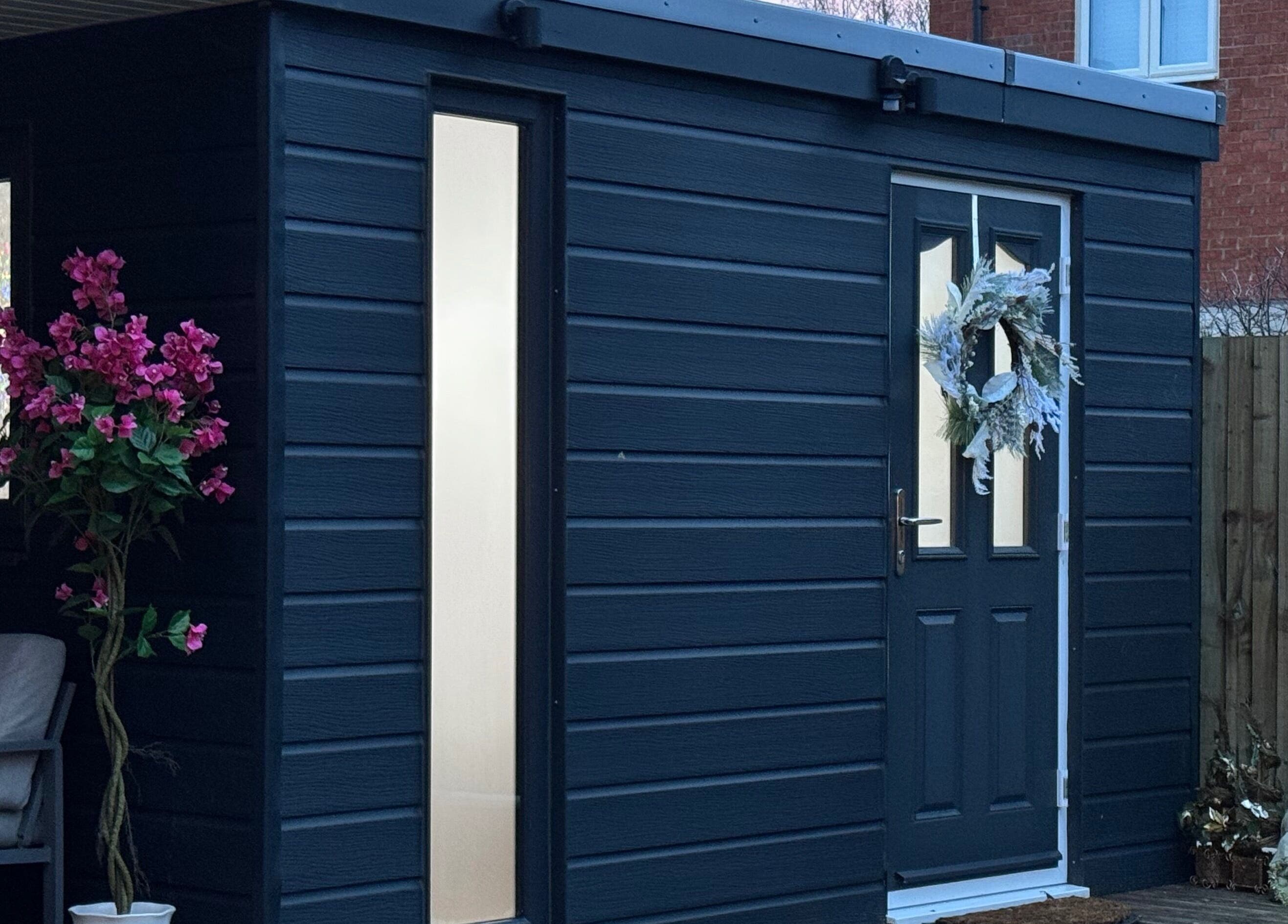 Elegant modern exterior of Electra Skin in Upton, England, GB, adorned with floral decor and welcoming vibes.