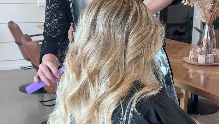 Blonde hair styled in waves at Lahera Hair Co, South Mackay, Queensland, AU, showcasing elegant salon services.