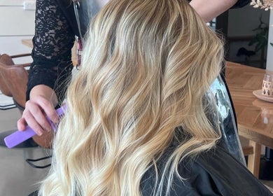 Blonde hair styled in waves at Lahera Hair Co, South Mackay, Queensland, AU, showcasing elegant salon services.
