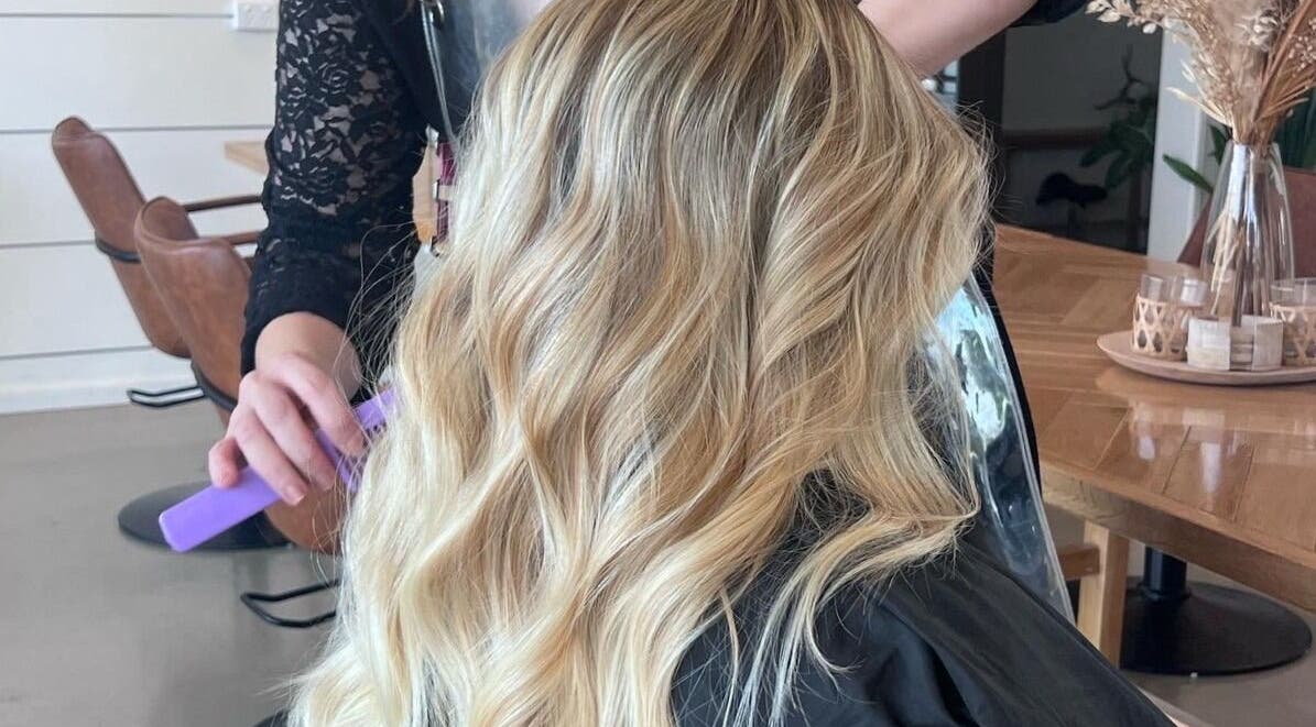 Blonde hair styled in waves at Lahera Hair Co, South Mackay, Queensland, AU, showcasing elegant salon services.