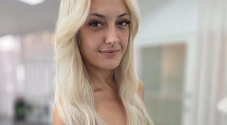 Stylish blonde hairstyle showcased at Lahera Hair Co, South Mackay, Queensland, AU salon interior.