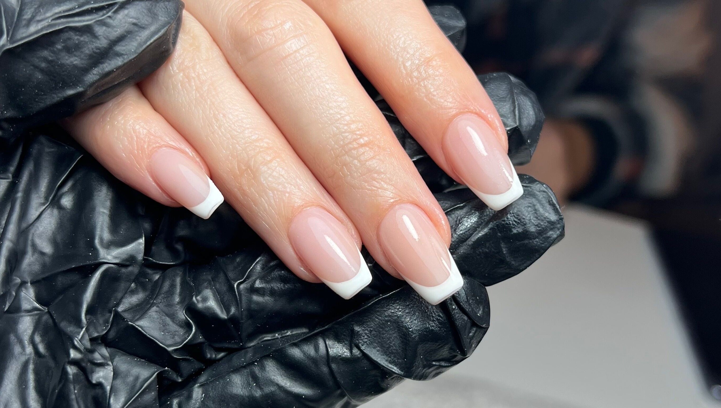 Elegant French manicure by Kate the Nailtech in Melbourne, Victoria, AU. Flawless nail artistry close-up.