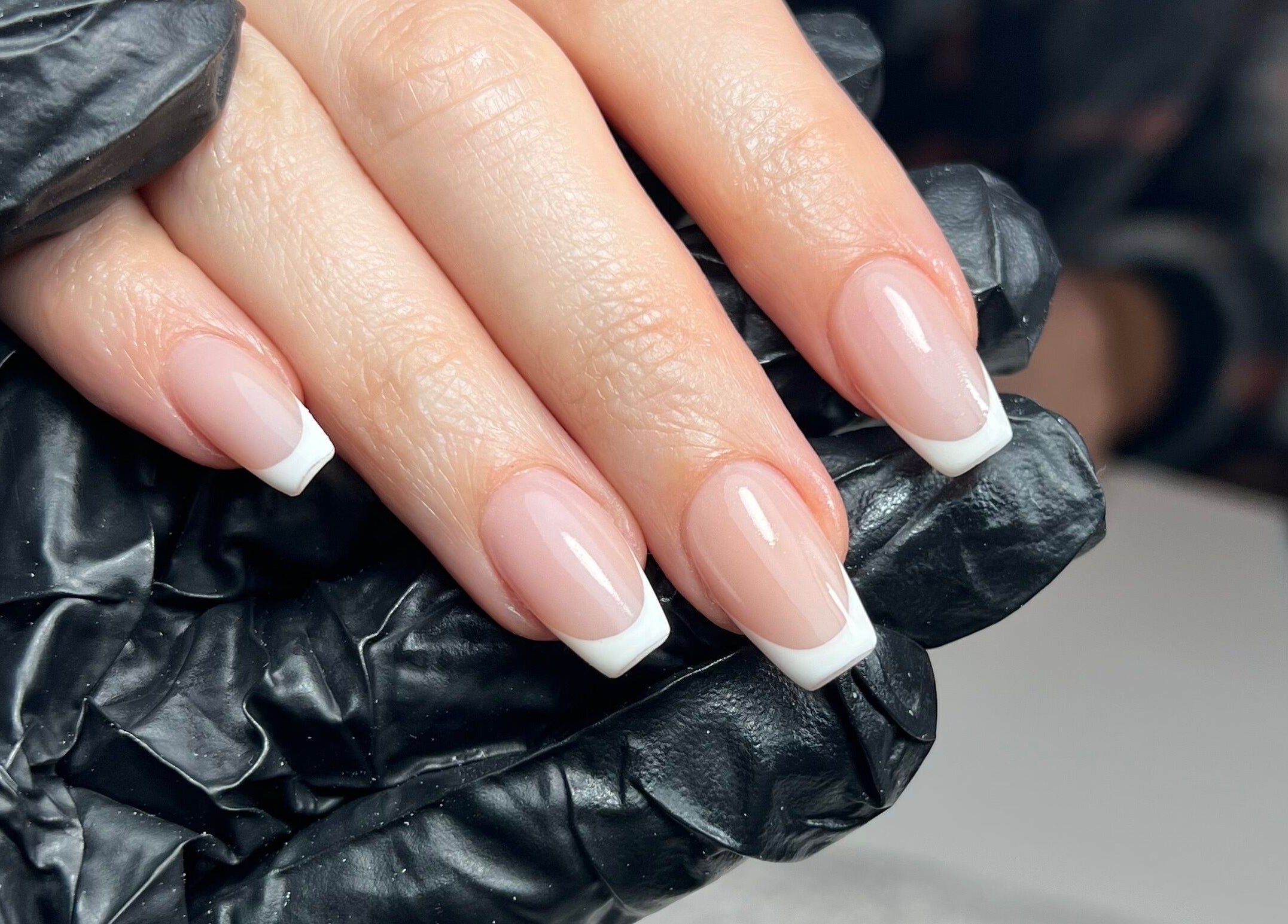 Elegant French manicure by Kate the Nailtech in Melbourne, Victoria, AU. Flawless nail artistry close-up.