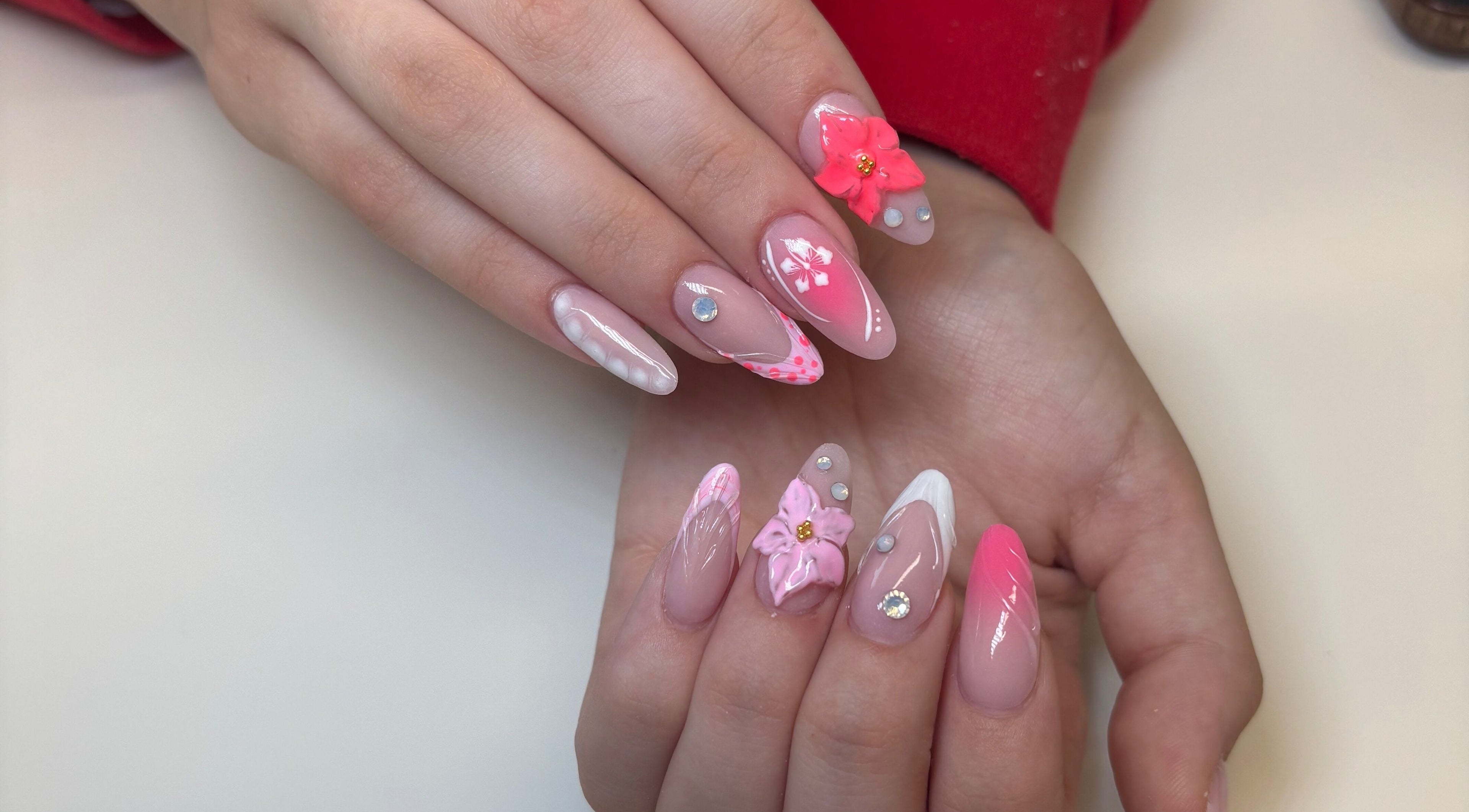 Stylish floral nail art design at Beauty By Charlotte Piper, Stalybridge, England, GB.