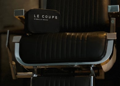 Luxury salon chair at LE COUPE, Amman, Amman Governorate, JO, highlighting elegance and comfort.