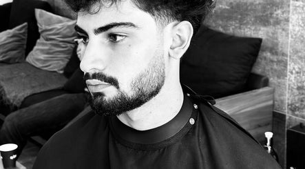Close-up of a freshly styled haircut at LE COUPE in Amman, Amman Governorate, JO.