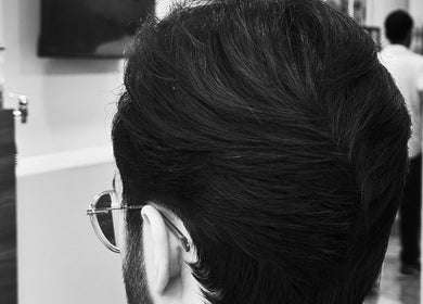 Sleek men's hairstyle at LE COUPE, Amman, Amman Governorate, JO for modern style enthusiasts.