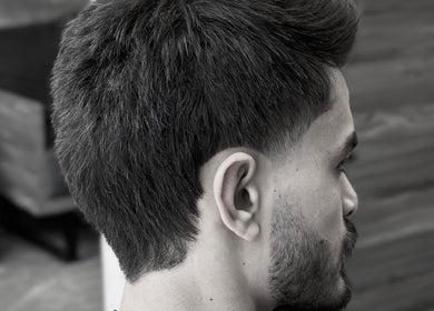 Side view of a stylish men's haircut at LE COUPE, Amman, Amman Governorate, JO.