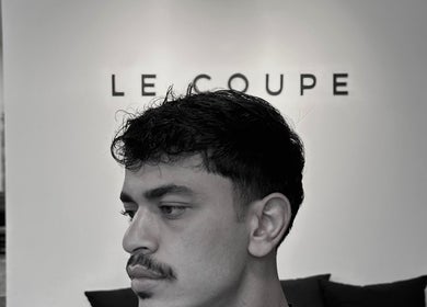 Modern haircut at LE COUPE in Amman, Amman Governorate, JO. Sleek interior visible in the background.