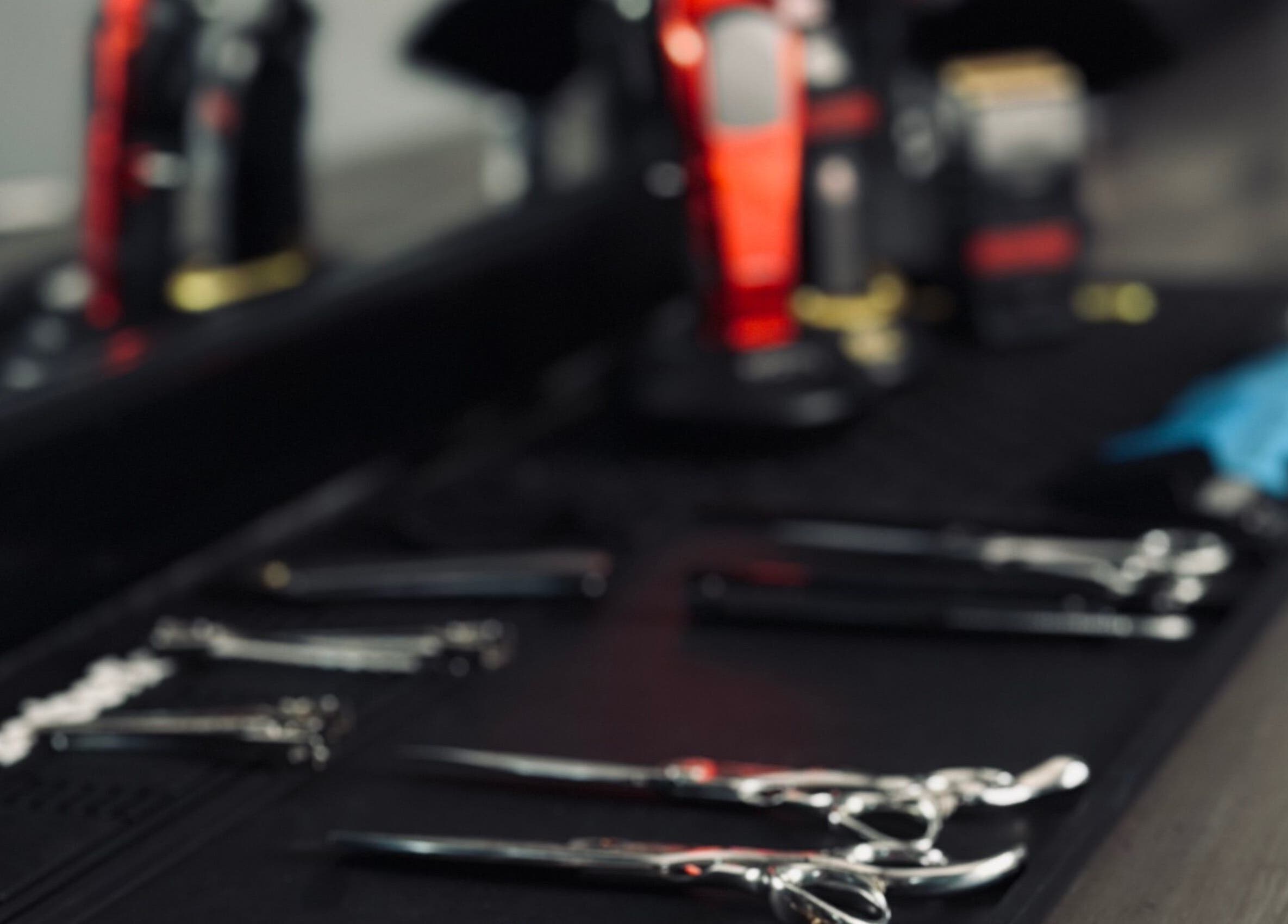Hair styling tools on a table at Le Coupe - لي كوب, Amman, Amman Governorate, JO.