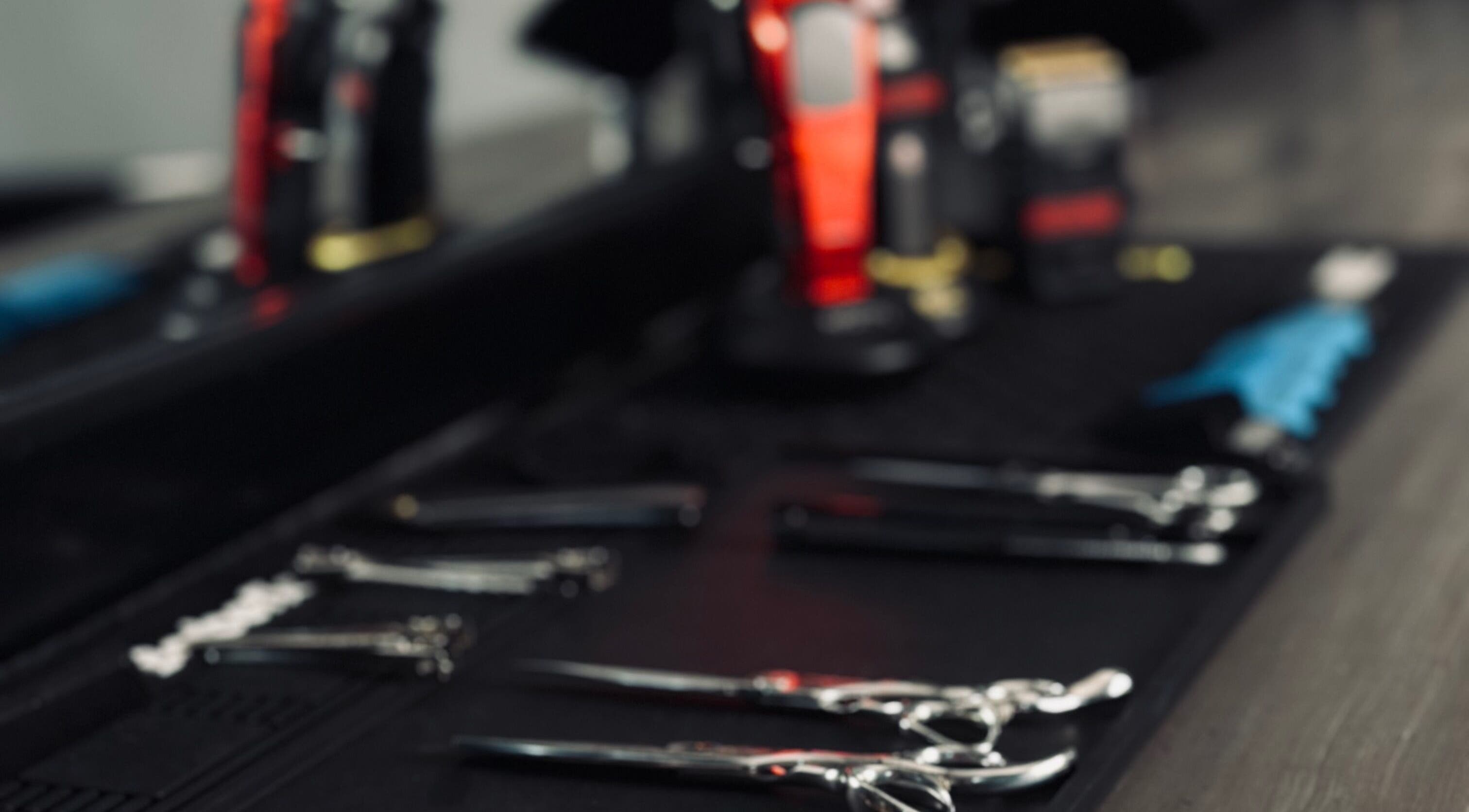 Hair tools and scissors at Le Coupe - لي كوب, Amman, Amman Governorate, JO, showcasing professional styling kits.