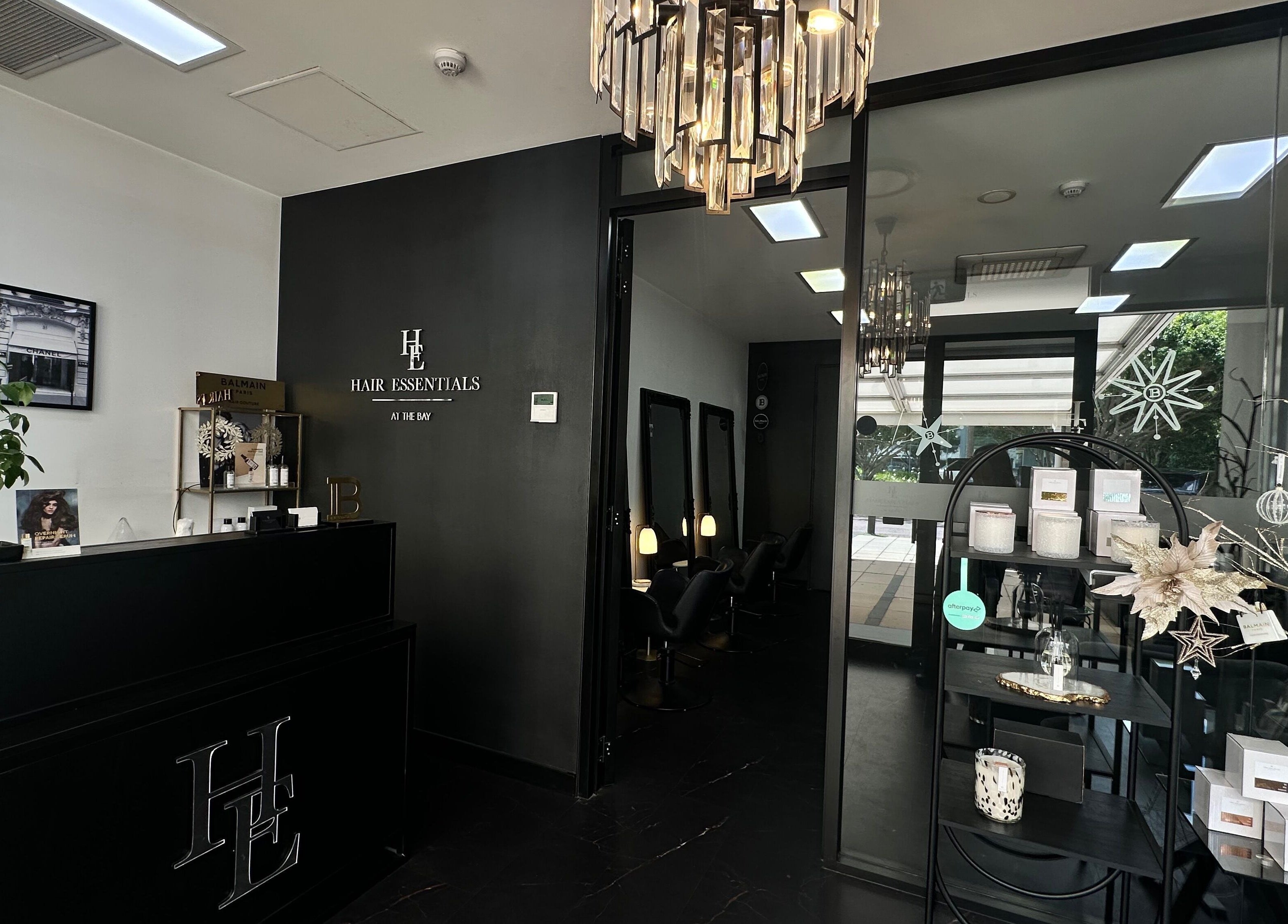 Chic interior of Hair Essentials at the Bay, Wentworth Point, New South Wales, AU featuring sleek decor.
