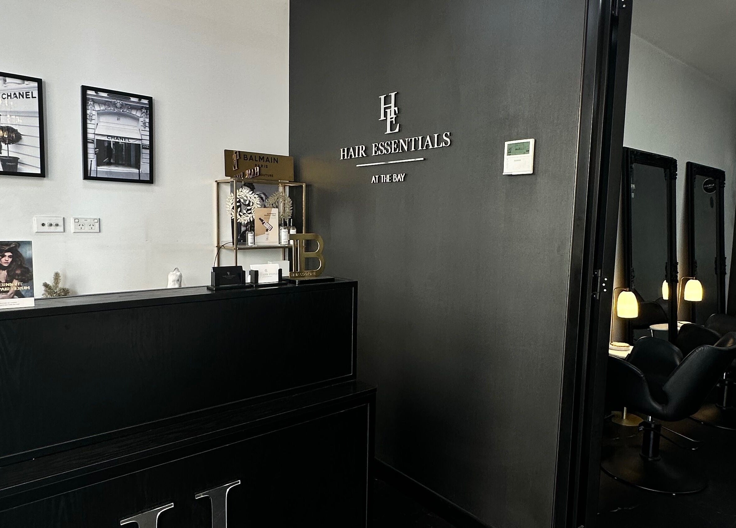 Reception at Hair Essentials at the Bay in Wentworth Point, New South Wales, AU, featuring modern decor.