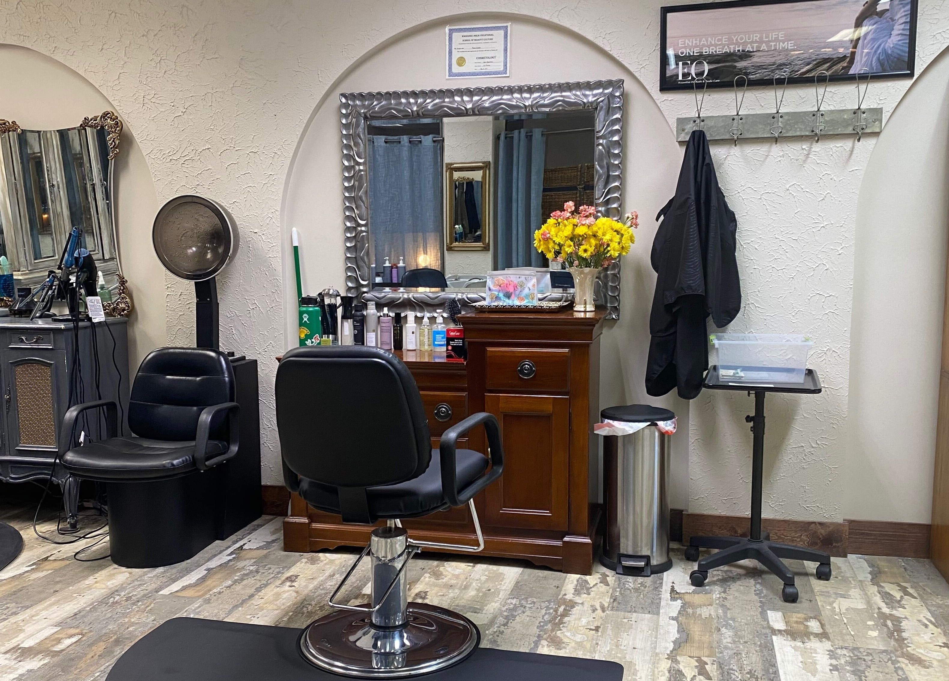 Elegant salon station with a mirror and chair at Palace of Wellness Salon and Spa, North Webster, Indiana, US.