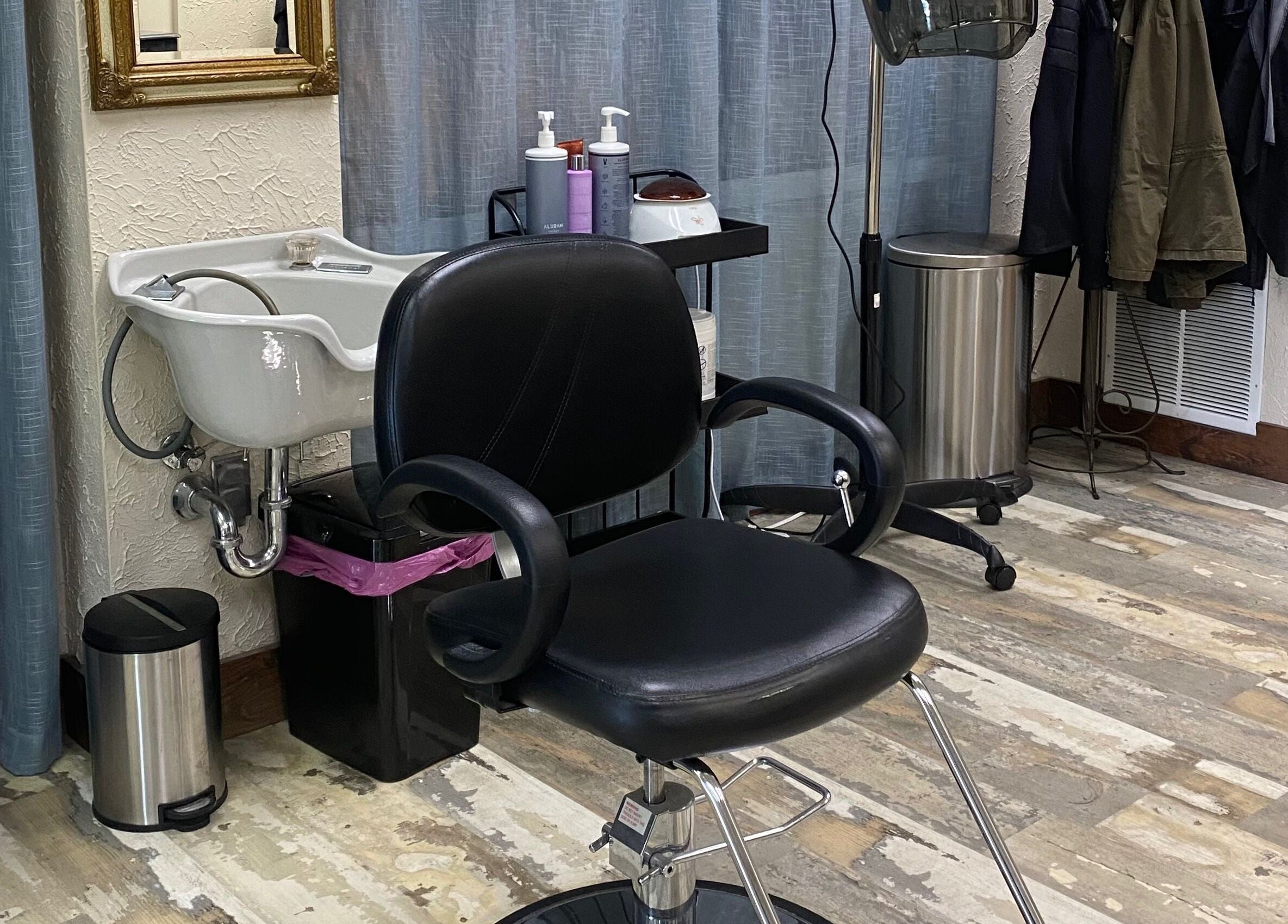 Elegant salon chair and wash basin at Palace of Wellness Salon and Spa, North Webster, Indiana, US.