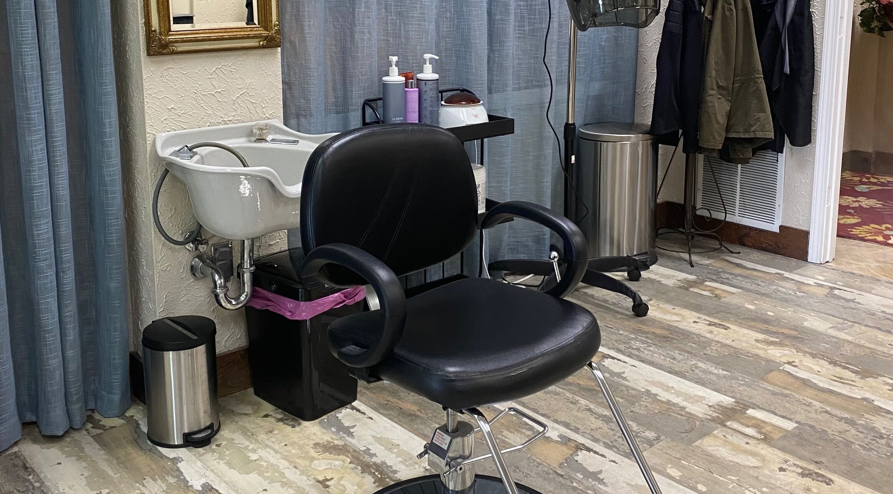 Elegant salon chair and wash basin at Palace of Wellness Salon and Spa, North Webster, Indiana, US.