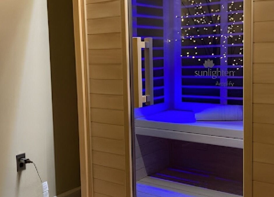 Peaceful sauna room with blue lighting at Palace of Wellness Salon and Spa, North Webster, Indiana, US.