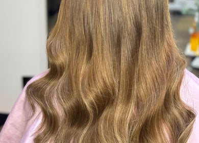 Elegant golden hair waves at La Bella Hair Extensions & Beauty, Wakefield, England, GB.