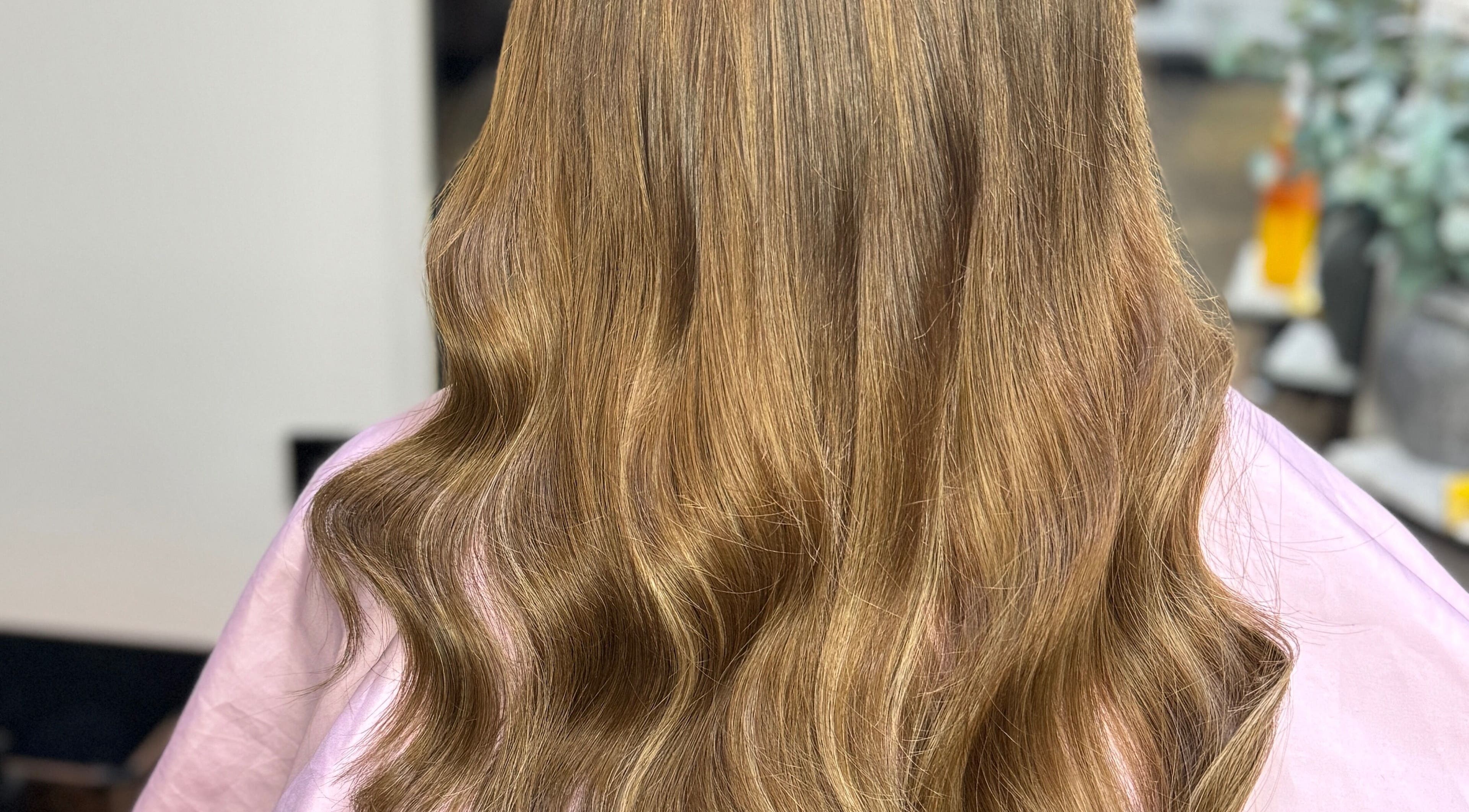 Elegant golden hair waves at La Bella Hair Extensions & Beauty, Wakefield, England, GB.
