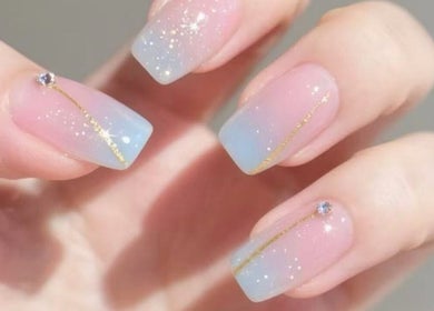 Elegant gradient nails with glitter at Aria Nail, Massage & Head Spa, Fairfax, Virginia, US.
