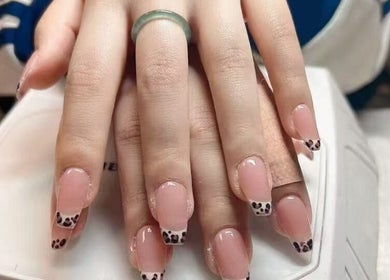 Stylish leopard print nail design at Unique Nails & Head Spa in Fairfax, Virginia, US.