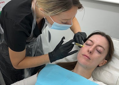 Skilled aesthetician at Absolute Skin & Aesthetics Fareham performs treatment in Fareham, England, GB.