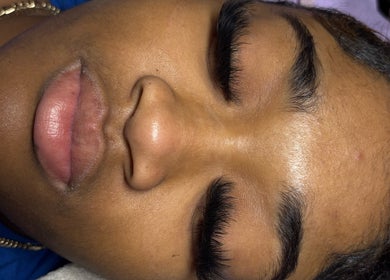 Close-up of a client with curled lashes at Pretty Girls Aesthetics in Buffalo, New York, US.