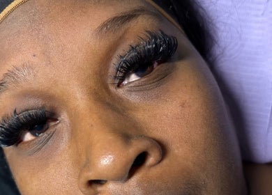 Closeup of full lashes at Pretty Girls Aesthetics, Buffalo, NY, US, showcasing expert eyelash extensions.