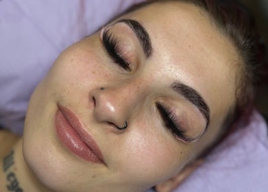 Close-up of eyelash extensions at Pretty Girls Aesthetics, Buffalo, NY, US, showcasing flawless beauty results.