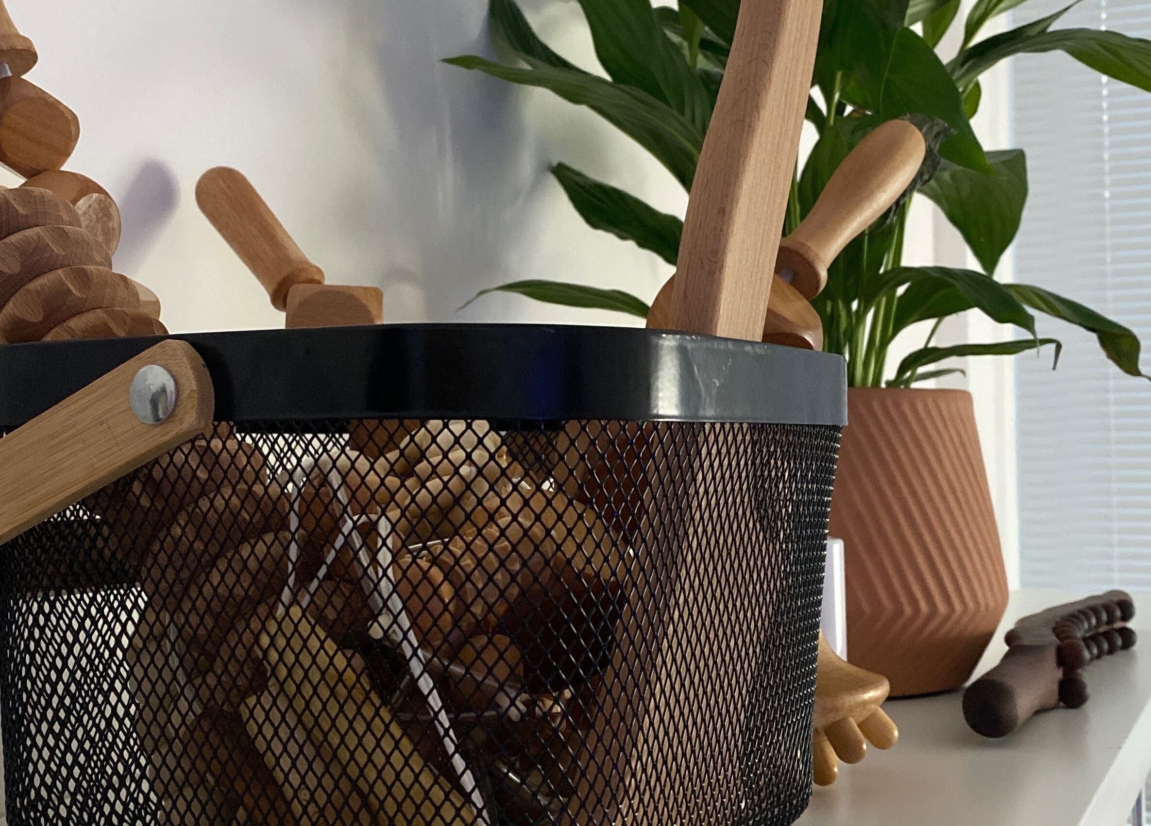 Wooden massage tools at Sculpted By Ariella, Cheltenham, England, GB enhance relaxation services.