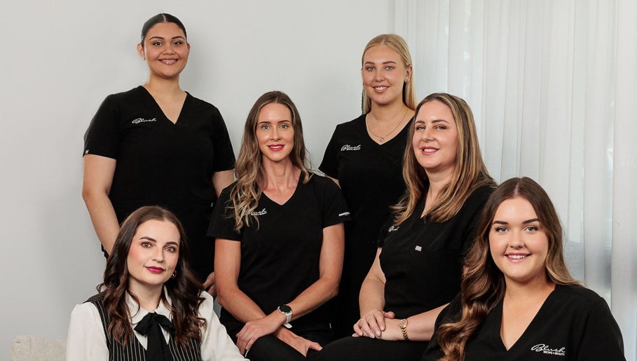 Blush Brows + Beauty staff smiling at North Mackay, Queensland, AU venue, showcasing teamwork and professionalism.