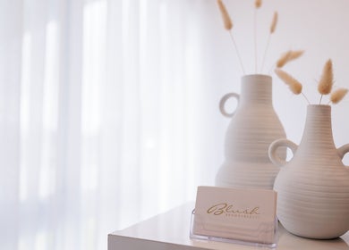 Elegant vases at Blush Brows + Beauty in North Mackay, Queensland, AU create a tranquil ambiance.