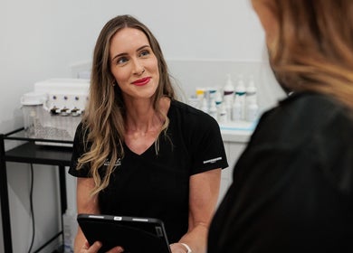 Client consultation at Blush Brows + Beauty, North Mackay, Queensland, AU, showcasing personalized beauty service.