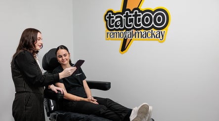 Consultation at Tattoo Removal Mackay in North Mackay, Queensland, AU with staff and client discussing treatments.