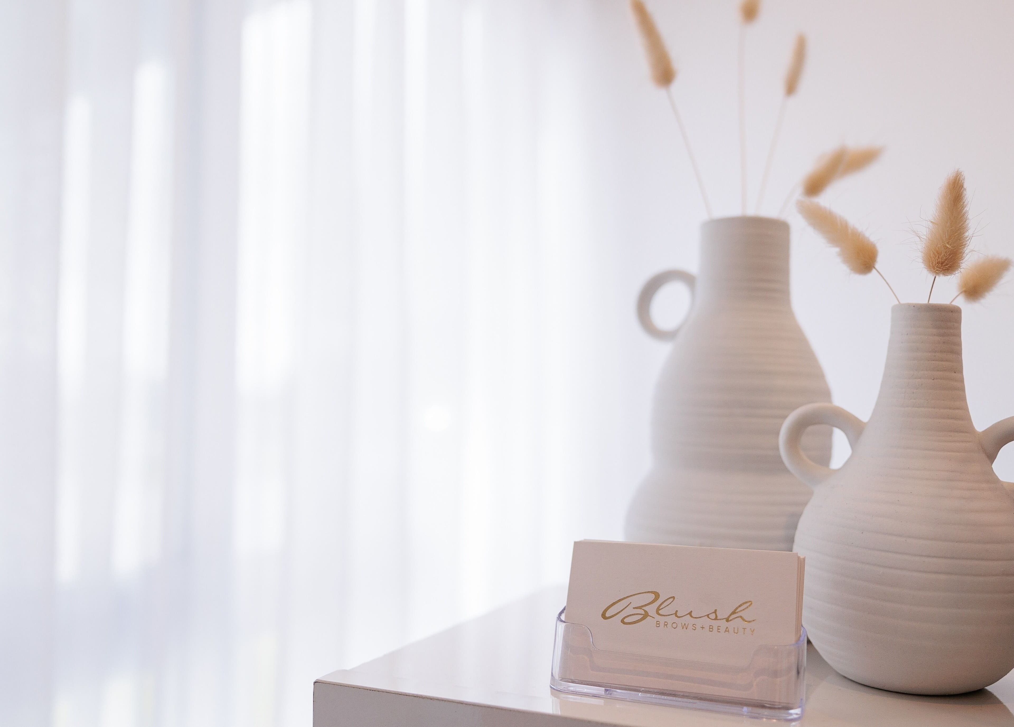 Elegant ceramic vases on display at Blush Brows and Beauty, North Mackay, Queensland, AU.