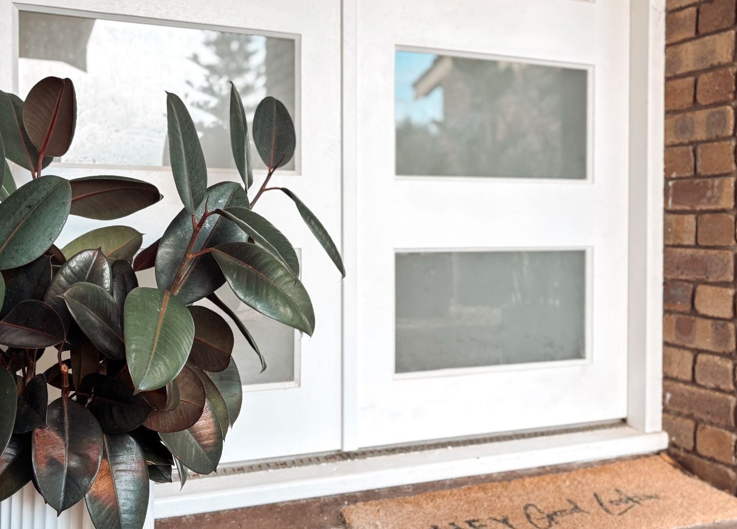 Entrance of SHIFT Body Sculpting with greenery, located in Waikiki, Western Australia, AU.