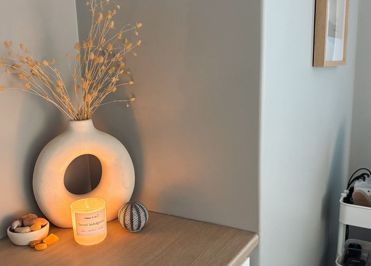 Cozy decor with candle and vase at SHIFT Body Sculpting, Waikiki, Western Australia, AU.