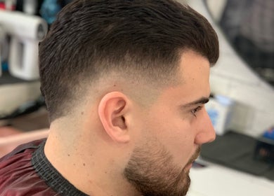 Close-up of a stylish fade haircut at T&E Barber in London, England, GB.