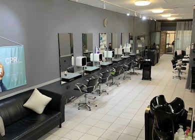 Inside view of April’s Hair Artistry And Hair Extension Studio, Campbelltown, New South Wales, AU, showcasing modern styling stations.