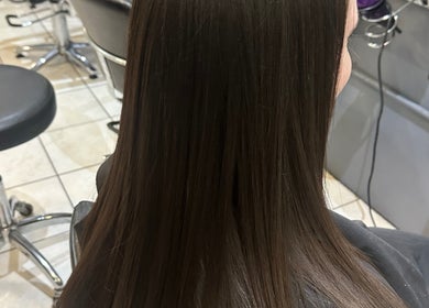 Sleek hairstyle at April’s Hair Artistry And Hair Extension Studio, Campbelltown, New South Wales, AU.