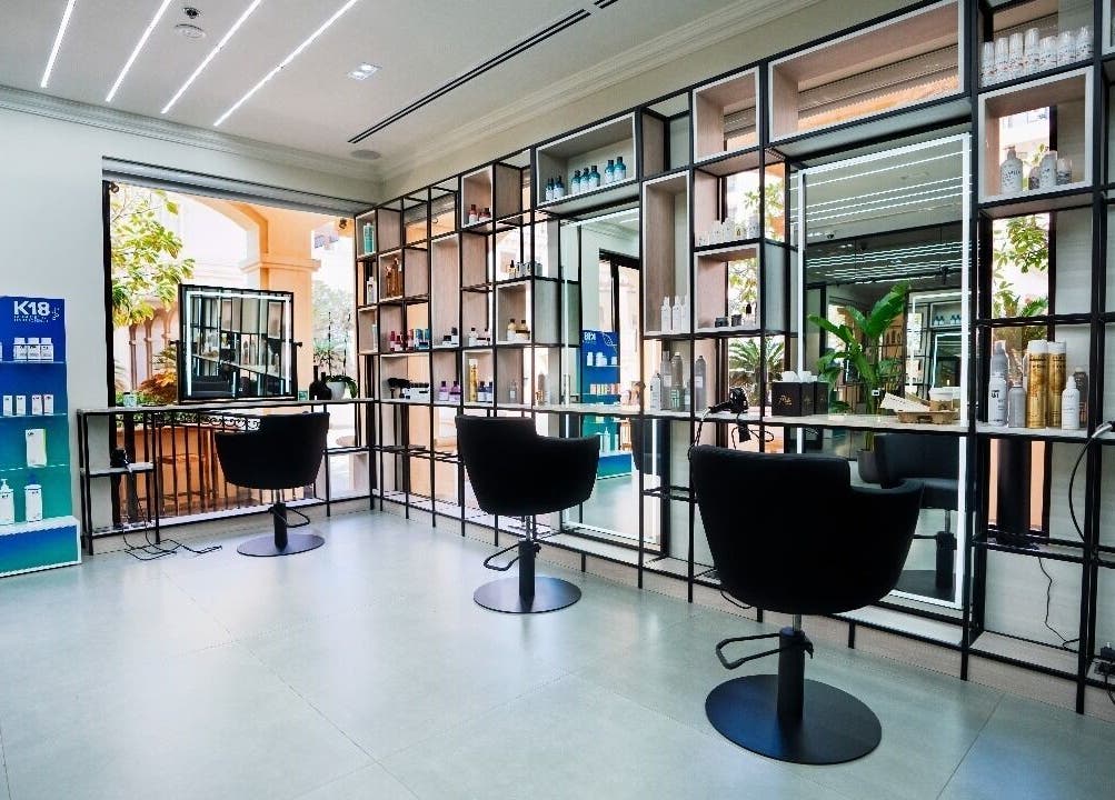 Modern salon interior with chairs and products at Mike's Beauty Lounge, أبو ظبي, أبو ظبي, AE.