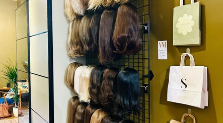 Wig selection at Matthew Morris with Peluka Salon, Southend on Sea, England, GB showcasing diverse styles.