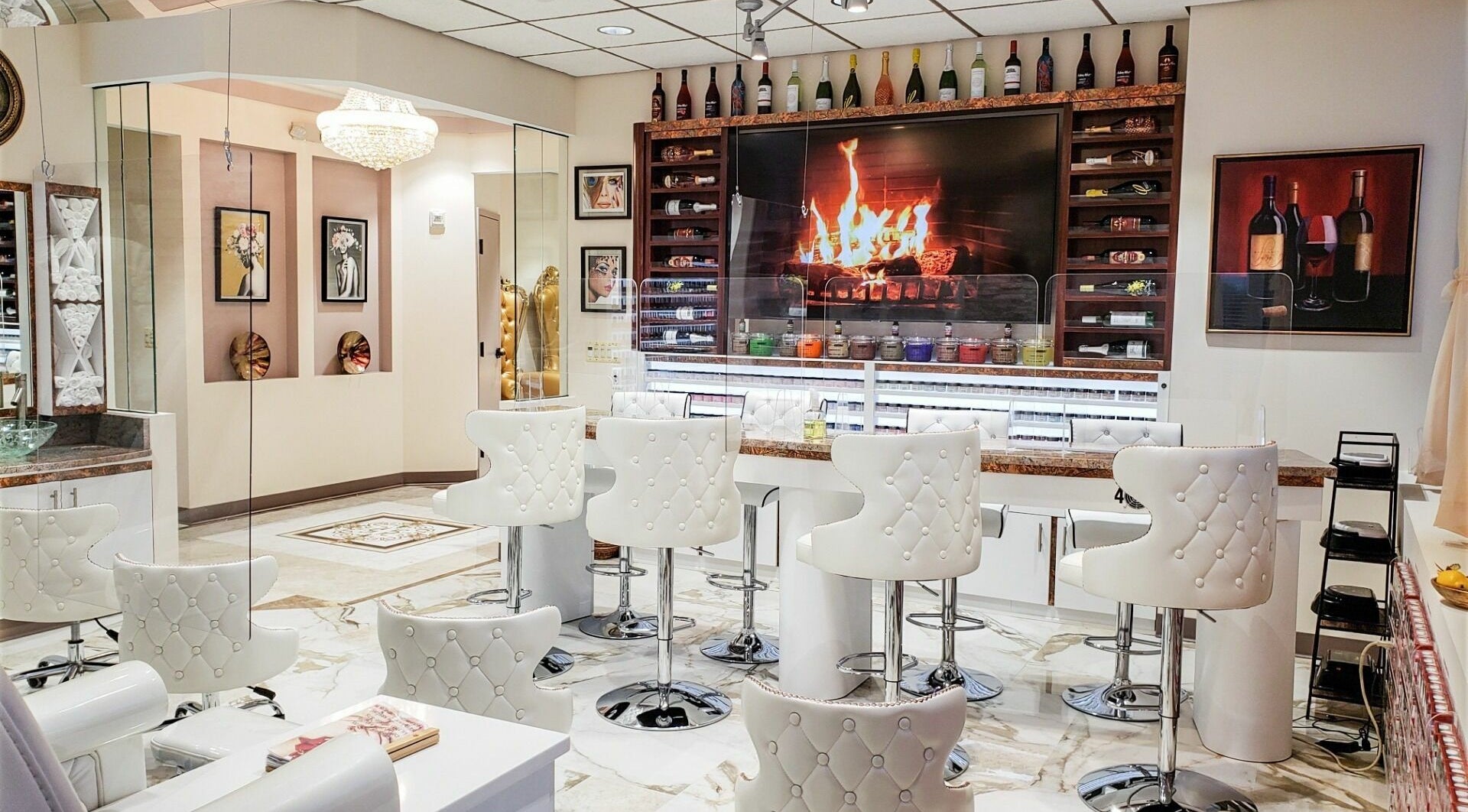 Elegant lounge at Lip Lash Organic Spa in Ashburn, Virginia, US with chic white chairs and plush decor.