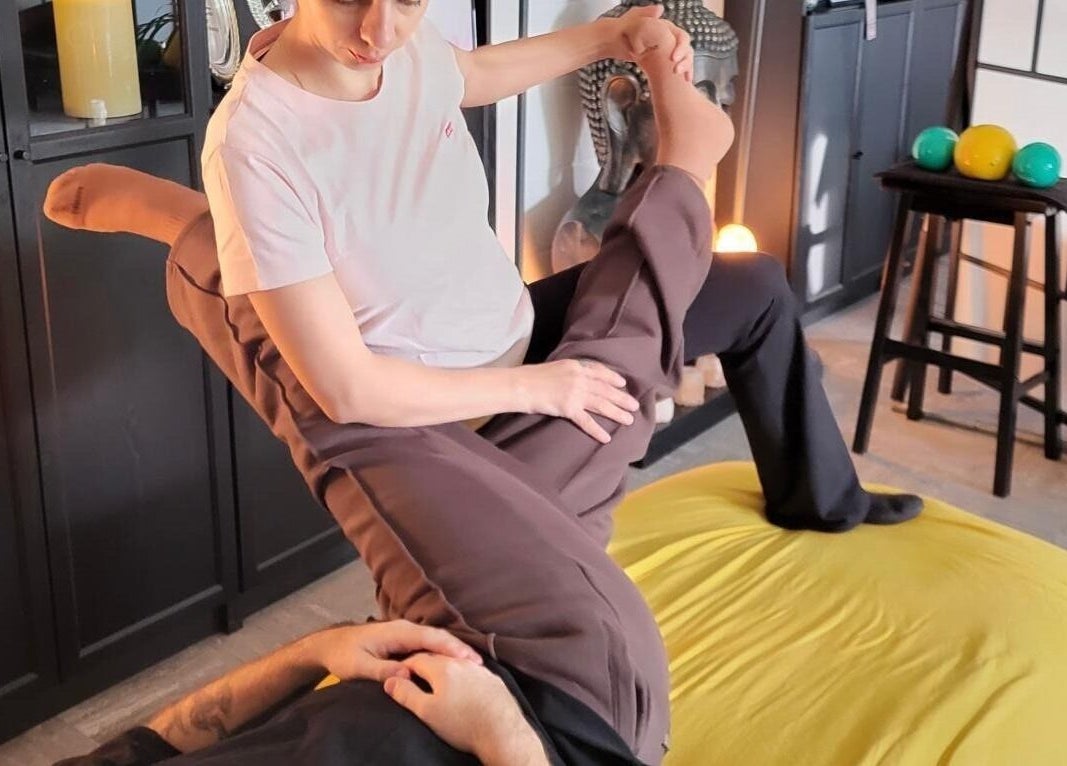 Therapist performing stretch at Massage & Beauty By Miky, In-naxxar, MT, enhances relaxation and flexibility.