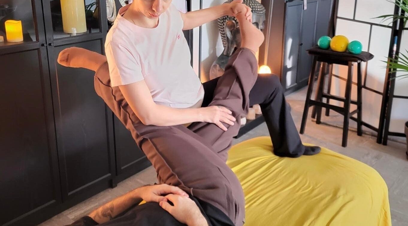 Therapist performing stretch at Massage & Beauty By Miky, In-naxxar, MT, enhances relaxation and flexibility.