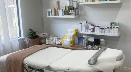 Luxurious treatment room at Healthy Skin Lab, Trinity Beach, Queensland, AU, showcasing premium skincare products.